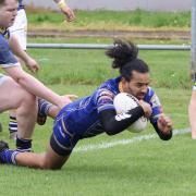 Aaron Holliday scores one of Crosfields' seven tries against Clock Face Miners