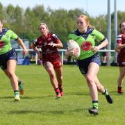 Anna Dennis scores a try against Leigh Leopards