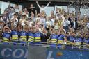 A picture of Warrington Wolves lifting the Challenge Cup in 2019 is prominent at the club's training ground