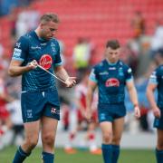 Dejected Wire players following their golden-point loss at Salford Red Devils