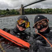 Leanne Clowes (left) and wife, Clare Dutton, who together own Phoenix Watersports, diving in the Menai Strait between Anglesey and the North Wales mainland
