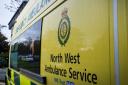 A man died after being hit by a transport ambulance