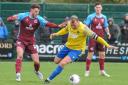 Action from Warrington Town's defeat to Scunthorpe United