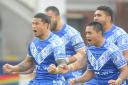 Anthony Milford, front right, at The Halliwell Jones Stadium with Samoa during the 2013 Rugby League World Cup. Picture by Mike Boden