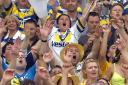 Celebrating the Warrington Wolves and Catalans Dragons embrace