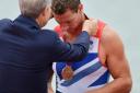 Richard Egington receives his bronze medal. Pictures by Jessica Mann
