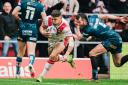 Saints' Tommy Makinson slips past Stefan Ratchford to send Wire to defeat when the two neighbours last met in the Super League play-offs last October