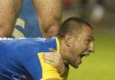 Jerome Guisset celebrates a try for Warrington Wolves against Wigan in the 2004 play-offs