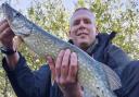 Warrington Anglers' Association member Johnny Hughes with a pike he caught this winter at Rixton Claypits in Woolston