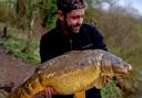 Chris Roberts with the jewel of his maiden two-night adventure on Rixton Claypits, a 20lbs mirror carp