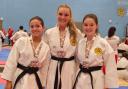 From left, Woolston Karate Club's Jasmin Thomas, Keeva Wignall and Ruby Owen
