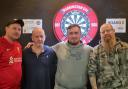 Luke Littler, second from right, with Wire Scaffolding 180s runner-up Clive Rule, second from left, and Warrington 501 Darts League committee members