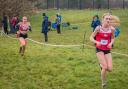 Cheshire Schools Cross Country League champion Esme Heavey being followed by clubmate and silver medalist Imogen Wharton