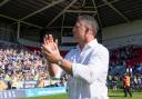 Sam Burgess salutes the Wire fans after the Challenge Cup semi-final win