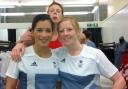 Holly Lam-Moores, left, and handball teammates have some fun while getting kitted out in GB attire after Olympic Games selection