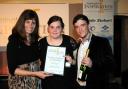 Natasha Price collects her award from Jess Criswell, deputy principal at Warrington Collegiate and George Sampson