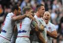 Celebrating the Sam Burgess converted try that put England 18-14 in front against holders New Zealand at Wembley. Picture by Mike Boden