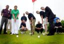 The team of eight take a round of golf to the extreme 	DGD250614