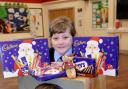 Grace Clarke and Renas Haij with some of the collected chocolate from the Sacred Heart chocolate raffle collection DGA151214