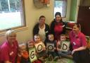 Denise Sharkey-Nursery Manager, Jenny Connor, Kirsty Ostell and Jeni Park with youngsters from the nursery