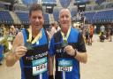 PCSO Dave Mahon (l) and PC Tony Davidson after completing the half marathon