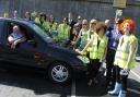 Relationships Centre staff and volunteers, right, clean up during the charity car wash