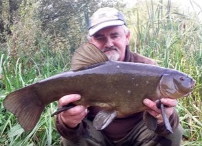 David Tomlinson and the tench he caught at Grey Mist