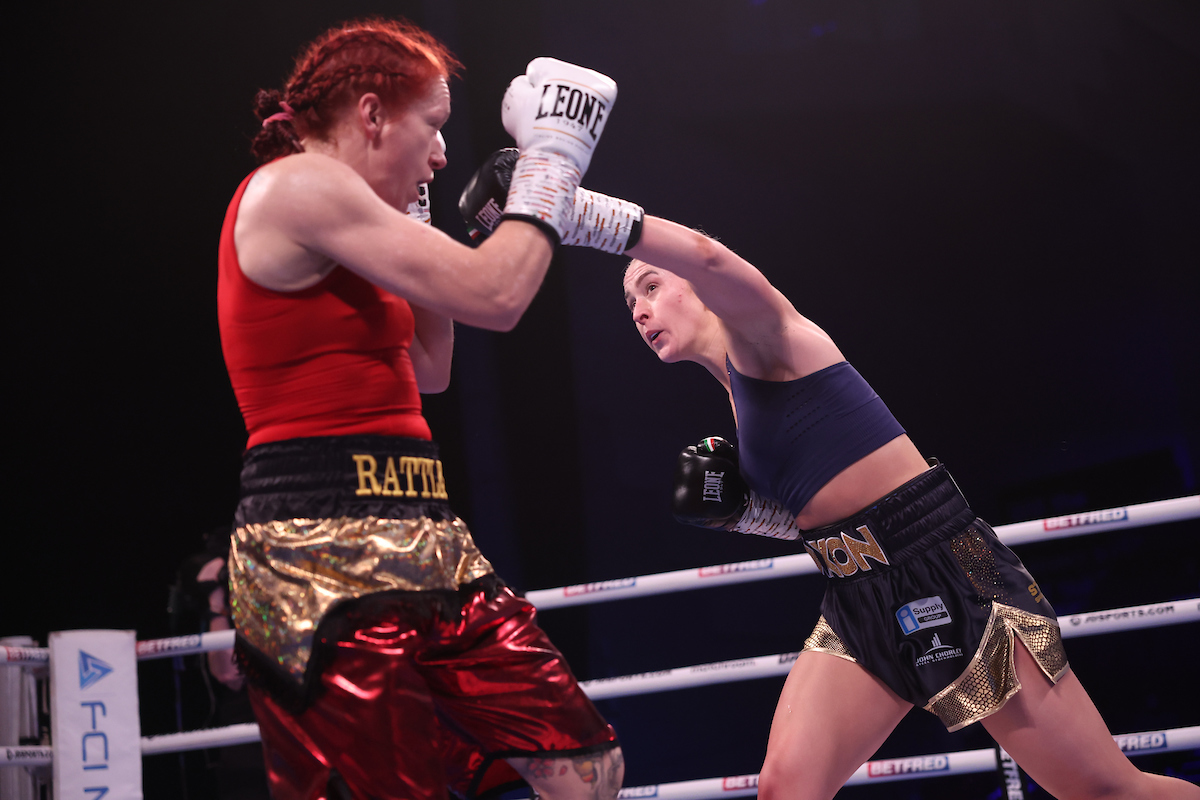 Rhiannon Dixon gets through with a big left against Kristine Shergold. Picture: Mark Robinson/ Matchroom Boxing