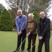 Peter Barrett, from Big Red Events, Alison McCausland, co-founder of The Relationships Centre and Robert Shaw, director of Tailormade, tee off for a successful fundraising extravaganza