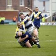 Danny Tickle gets to grips with Warrington's Stuart Reardon earlier this year