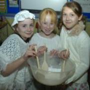 Stepping back in time are Corinna Ruth aged nine, Louis Skinner aged 10 and Aimee Pownall aged 10                           DTP281107