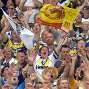 Celebrating the Warrington Wolves and Catalans Dragons embrace