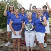 The Warrington Golf Club team celebrate their victory
