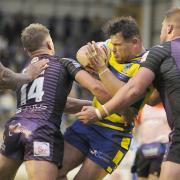 Joe Philbin throws himself into the Warrington Wolves attack against Leeds Rhinos during the 2021 Super League season. Picture: Mike Boden