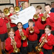 St Matthews CofE pupils with Gill Nightingale (back middle) from Cream - Pictures: Dave Gillespie