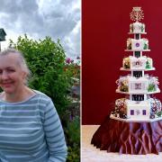 Christine Flinn and the cake she helped make for the Queen's Platinum Jubilee