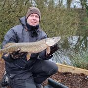 Johnny Hughes with his Rixton Claypits pike catch