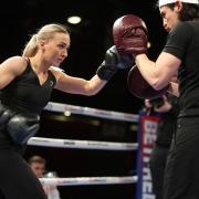 Rhiannon Dixon running through a public workout with her trainer Anthony Crolla at Black-E in Liverpool on Wednesday. Picture: Mark Robinson/ Matchroom Boxing