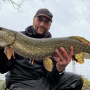 Garry Whitehead with the biggest of his three pike caught on a session at the Sandiway lakes