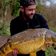 Chris Roberts with the jewel of his maiden two-night adventure on Rixton Claypits, a 20lbs mirror carp