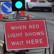 Two-way traffic control lights are in place