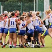 Mark Roughsedge and his Great Britain Women's 30s team celebrate winning the ITF Tag World Cup in Limerick