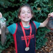 A Ravenbank Community School student is reunited with the trainers she lost while running round the Walton Gardens cross country course. She was not the only one to complete the race with no shoes on