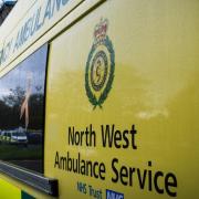 A man died after being hit by a transport ambulance