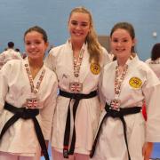 From left, Woolston Karate Club's Jasmin Thomas, Keeva Wignall and Ruby Owen