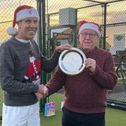 Pete Radcliffe, left, receives the LTA Volunteer of the Year Award from the chairman of Manor Road Tennis Club, Keith Moss