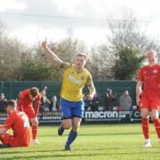 Matty McDonald celebrates after putting Warrington Town ahead against Brackley Town
