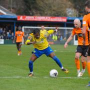 Isaac Buckley-Ricketts is crowded out against Darlington