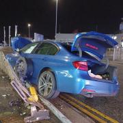 Two people have been arrested after a BMW crashed in Warrington