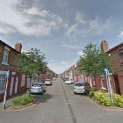 The body of Michael Smith was found at his home on Oldham Street by police officers